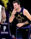 Doncic returns with 42 as Lakers down Cavs50