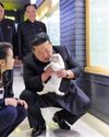North Korea's Kim pets puppies, kittens at Pyongyang pet shop34
