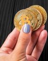 An Empowering Coin