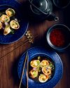 Steamed tiger prawn and scallop dumplings with XO dressing Steamed tiger prawn and scallop dumplings with XO dressing